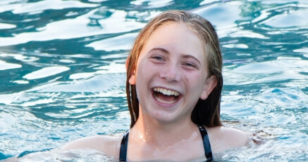 A woman swimming in a pool