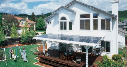 A home with a solar panel roof on the porch