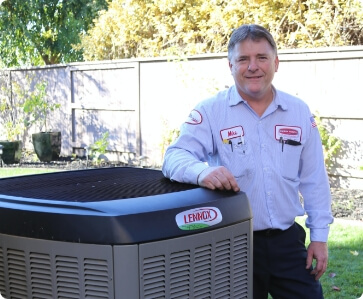 A Sierra Pacific Tech standing next to a Lennox air handler.