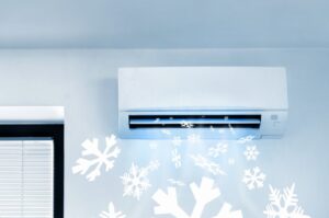 ductless-air-handler-with-animated-snowflakes-coming-out-of-it